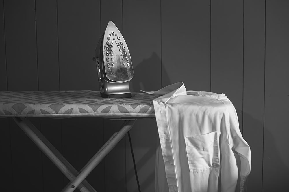 black and white photo by MSU photo student Maurissa Shumpert of ironing board with iron and shirt