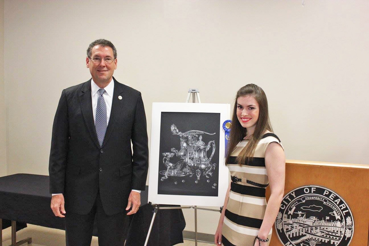 Mississippi State University art student Marika Dunne (right) with U.S. Rep. Gregg Harper, R-Mississippi