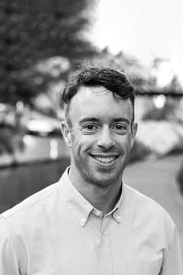 black and white headshot of Matthew Wallace