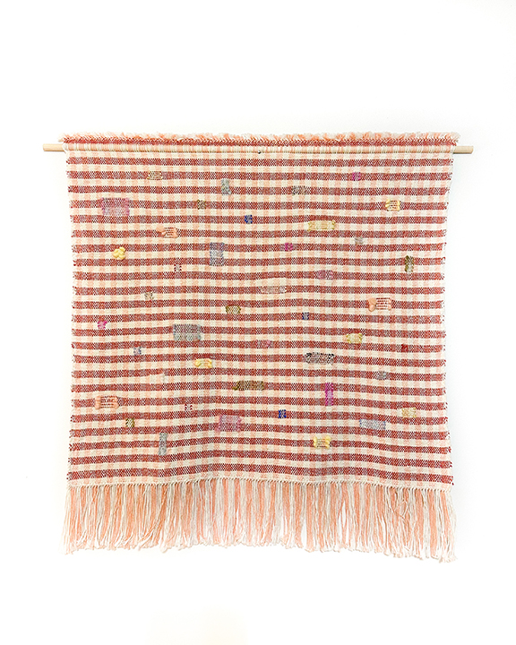 Woven yarn square wall hanging.