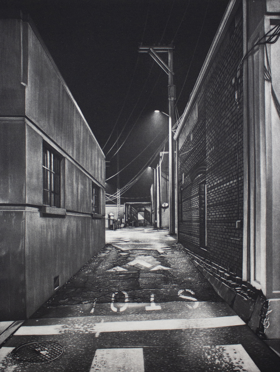Black and white image of an alley at night.