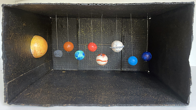 Diorama sculpture of the planets.