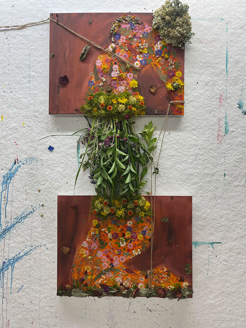 flowers on two stacked paintings