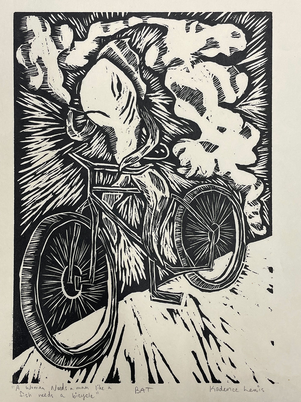 A printed image of a coy fish riding a bicycle, with a unique pattern of shapes in the background. 