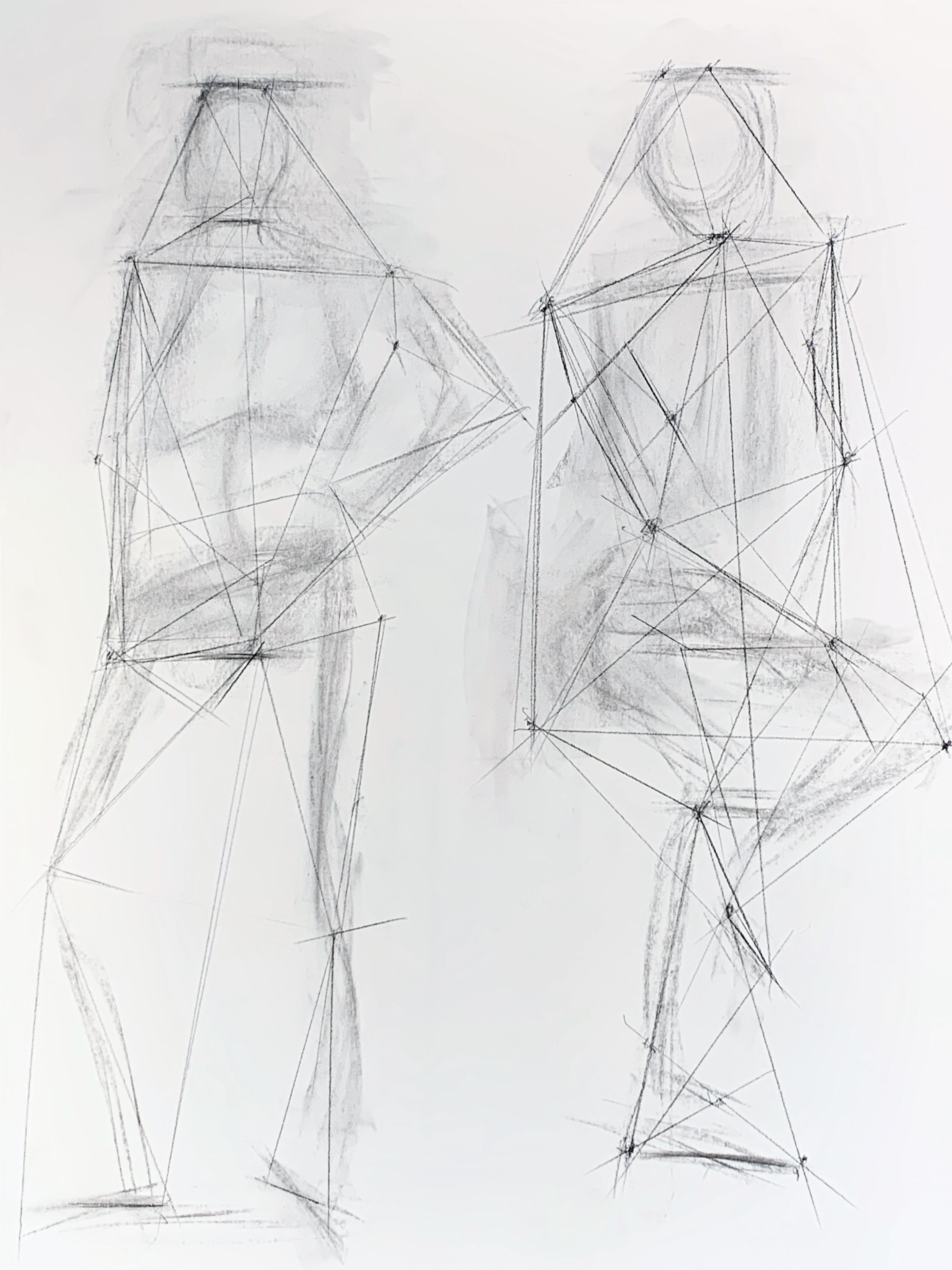A drawing composed of several lines, outlining the gesture figure of a human- including angles, proportions, and spatial relationships, drawn in vine charcoal.