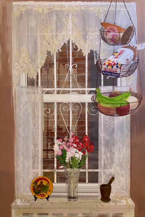 kitchen window with 3-tier basket hanging at top right holding fruit and Wonder bread; flowers on window sill