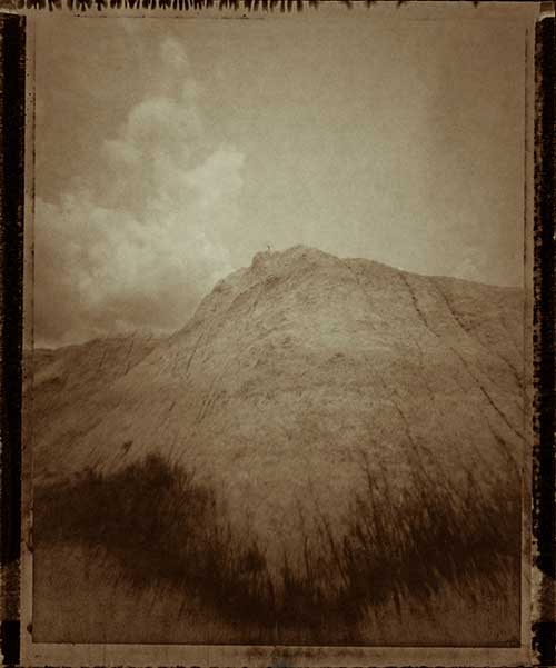 b/w image of a mountain - looks old
