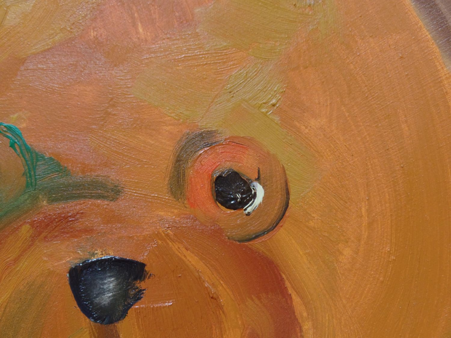Close up of a painting of a stuff animal's eye.