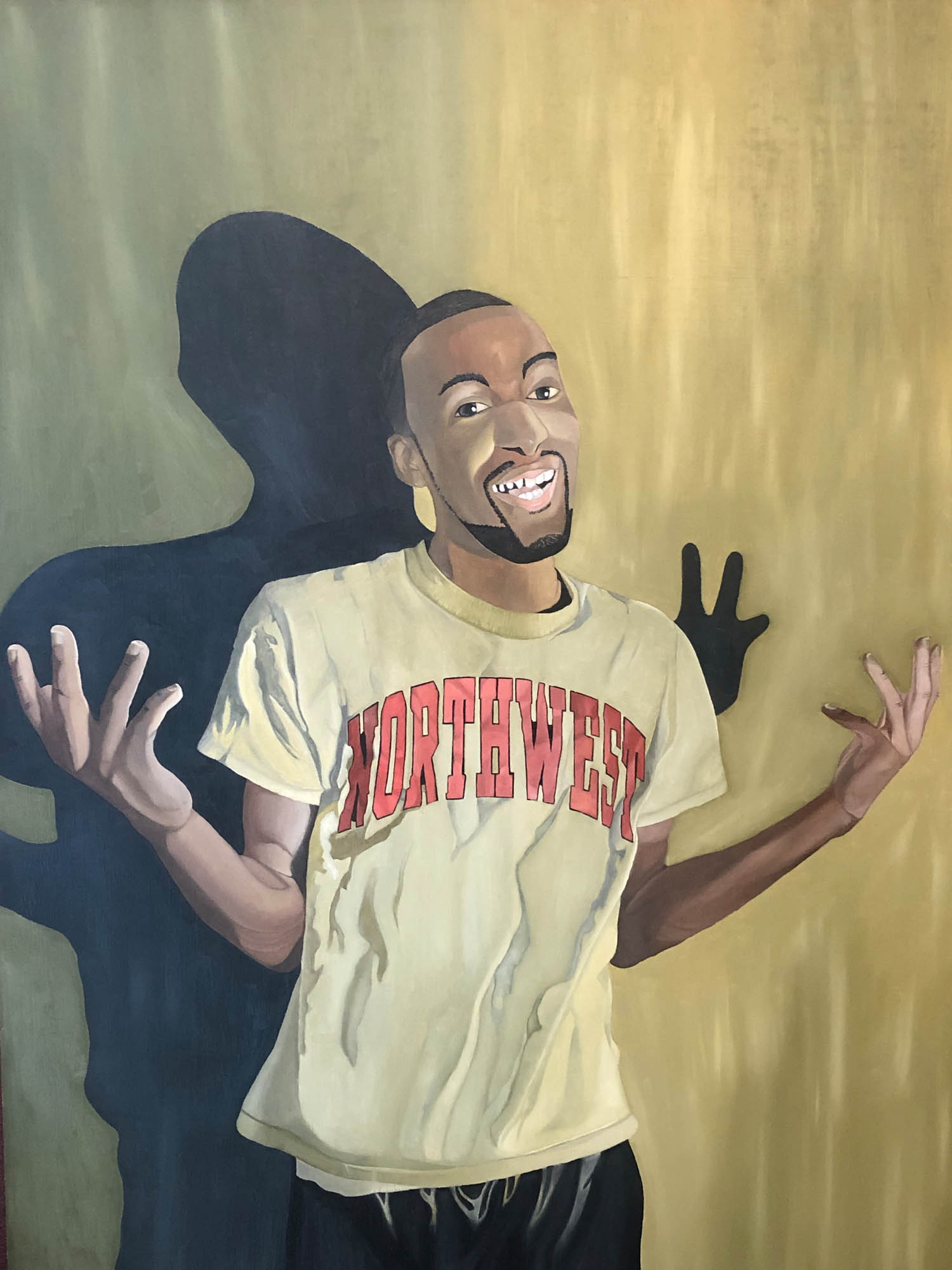 African American male friend emphasizing an emotion of happiness. Wearing a warm green colored shirt, with dark black shorts. Incorporating multiple areas of warm tone greens onto the skin of the face, neck, hands, and arms. Also, having a shade silhouette behind the male figure. Warm and cool tones of greens on the background to compliment both the figure and the emotion of happiness. Detailed and textural areas within the shirt, shorts, arms, face, and background.