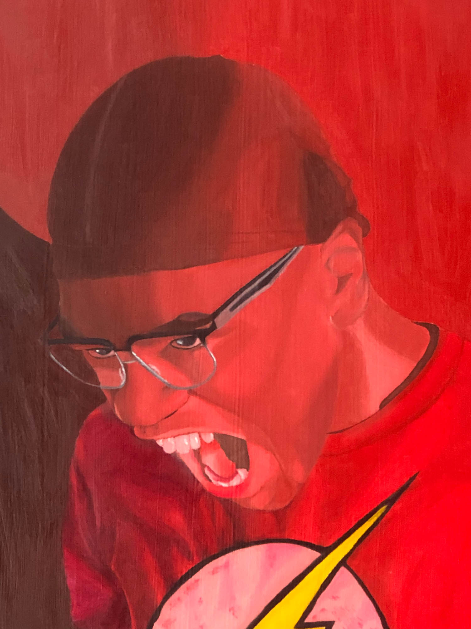 African American male friend emphasizing an emotion of anger. Detailed and textural image of specific brush stroke and paint layering of light reds, dark reds, grays, browns, and blacks on the male figure’s face and facial features, which helps compliments the emotional feeling of “provocation”
