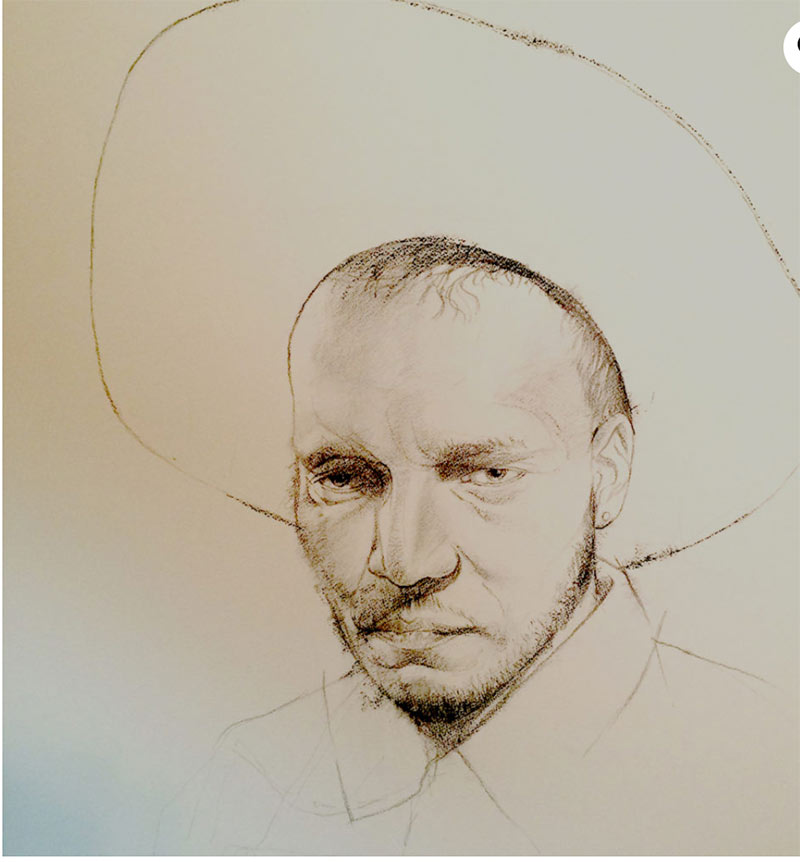 sketch of man wearing cowboy hat - just black lines on white paper