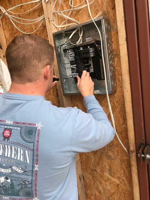 Mississippi State students in BCS 3212 Electrical Systems wired a tiny house built by first-year students