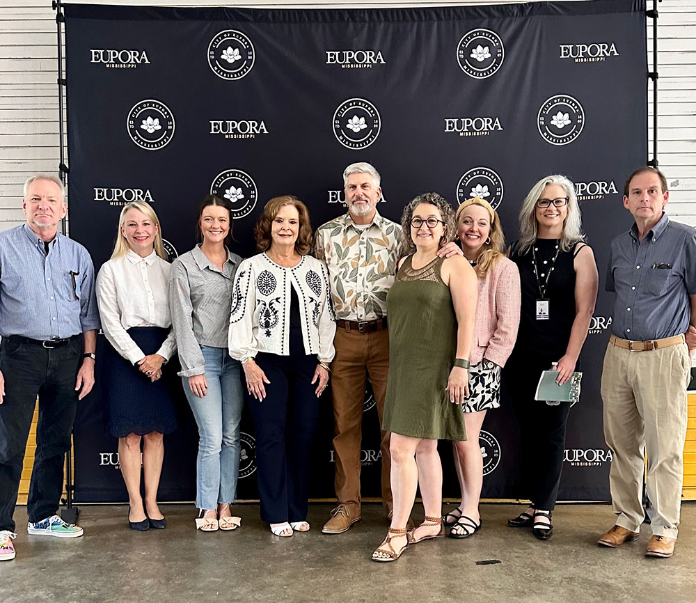 MSU MFA students, faculty, alumni and grads pose at symposium.