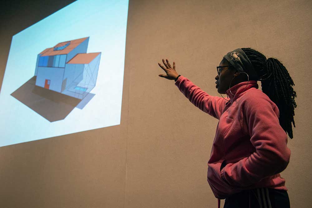 Jasmine E. Topps, a sophomore architecture student from Columbus, presents a site plan she created for a facility design project benefiting the Boys and Girls Club of the Golden Triangle. With help from MSU’s National Organization of Minority Architects student chapter and Columbus-based firm Major Design Studio, the nonprofit organization is planning new Boys and Girls Club locations in Starkville and West Point. (photo by Megan Bean / © Mississippi State University)