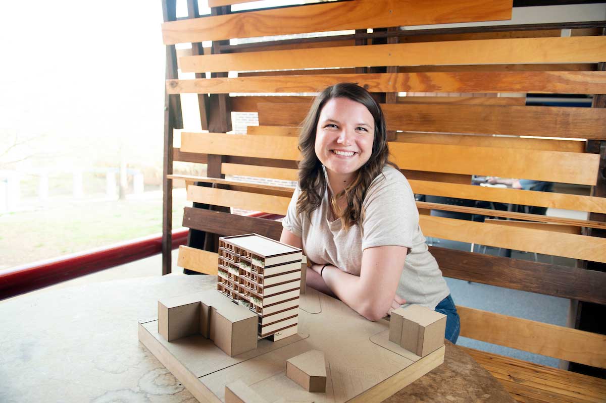 Kaitlyn Breland poses with an architecture model inside Giles Hall, Mississippi State University, Starkville campus  (photo by Megan Bean / © Mississippi State University)